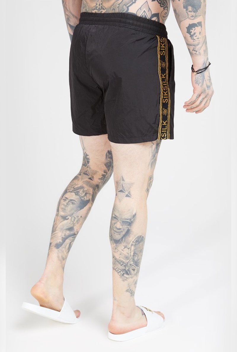 CRUSHED NYLON III TAPE SHORTS