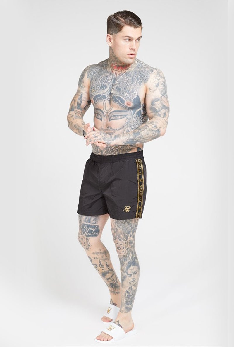 CRUSHED NYLON III TAPE SHORTS